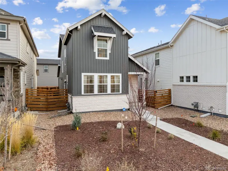 Exterior details and patio area of a home in The Aurora Highlands Horizon Collection, Aurora (Image 3).