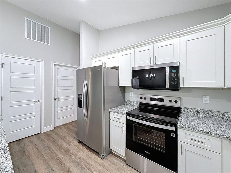 Furnished interior view inside a new home in , Dunnellon (Image 18).