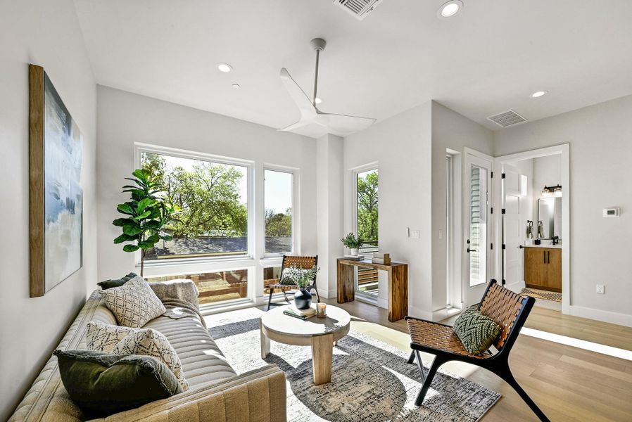 2nd Floor Open Living area with plenty of space for seating. (This is Unit #2 - each Unit has the same layout, however a few differing details such as light fixtures, custom cabinet/backsplash/tile colors)
