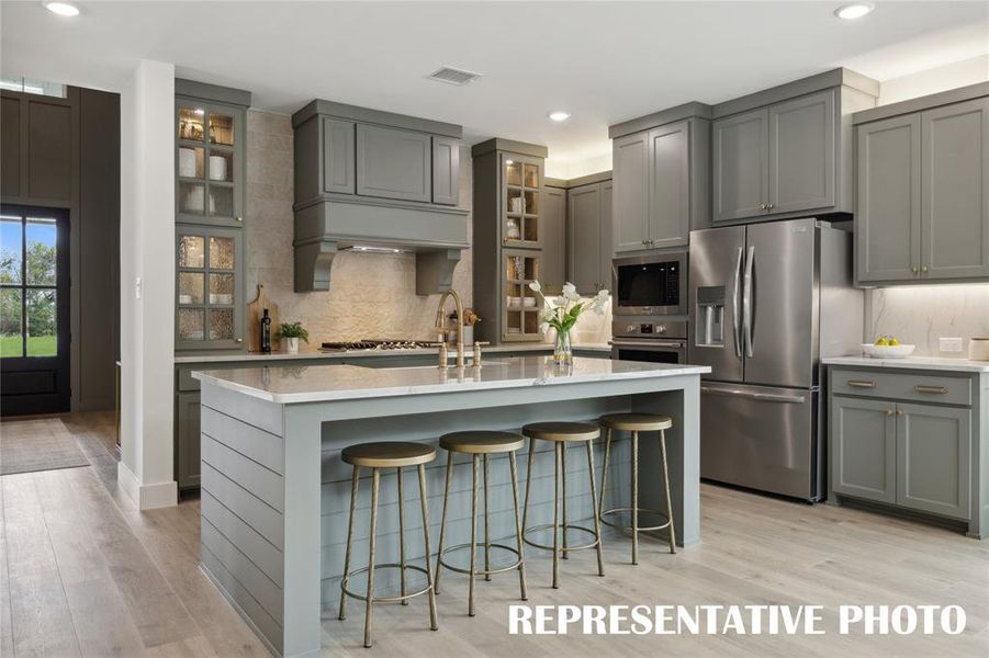 The kitchen of your dreams filled with beautiful finishes and state of the art appliances can be found in our homes in Cross Creek Meadows!  REPRESENTATIVE PHOTO