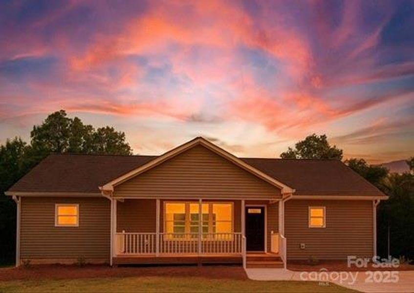 Front exterior of a new home in , Rutherfordton, NC, highlighting curb appeal (Image 14).