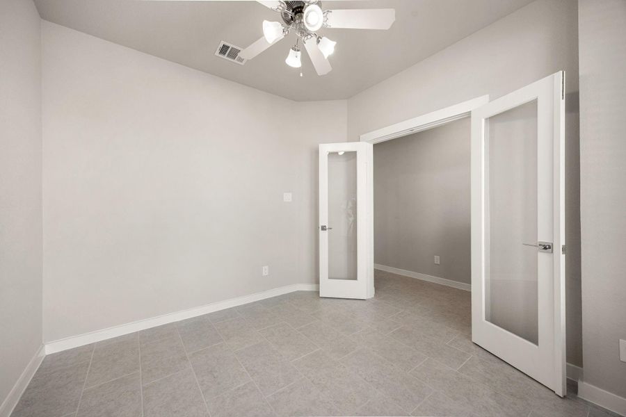 Home Office/Study includes French doors for privacy.