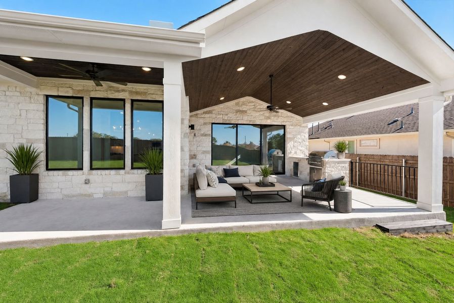 Exterior details and patio area of a home in Riverstone, Georgetown (Image 3).
