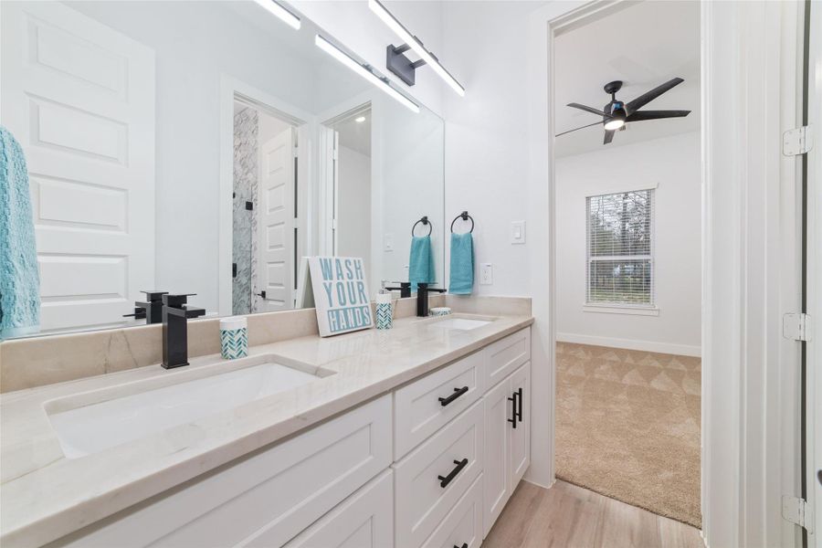 *ACTUAL HOME NOT PICTURED* This is a previously completed home in the neighborhood. Same floor plan with opposite orientation. Very similar cosmetic features will be in this home.