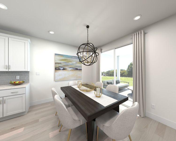The open-concept floorplan allows for an easy flow between the kitchen and dining areas.
