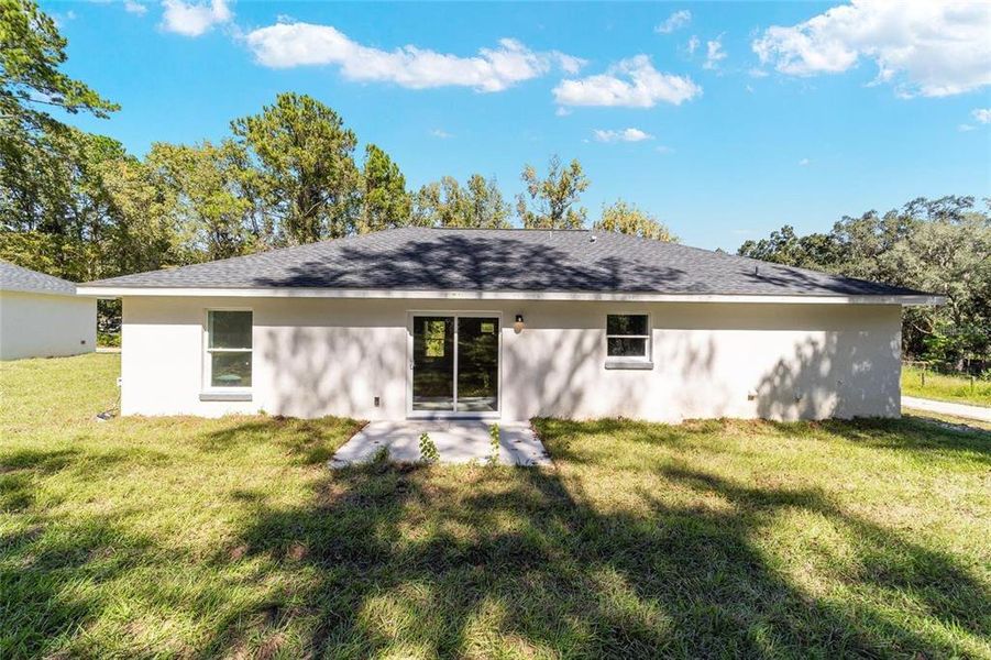 Exterior details and patio area of a home in , Ocala (Image 16).