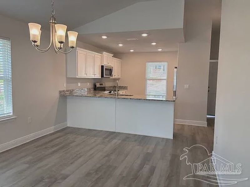 Furnished interior view inside a new home in Turtle Creek, Cantonment (Image 4).