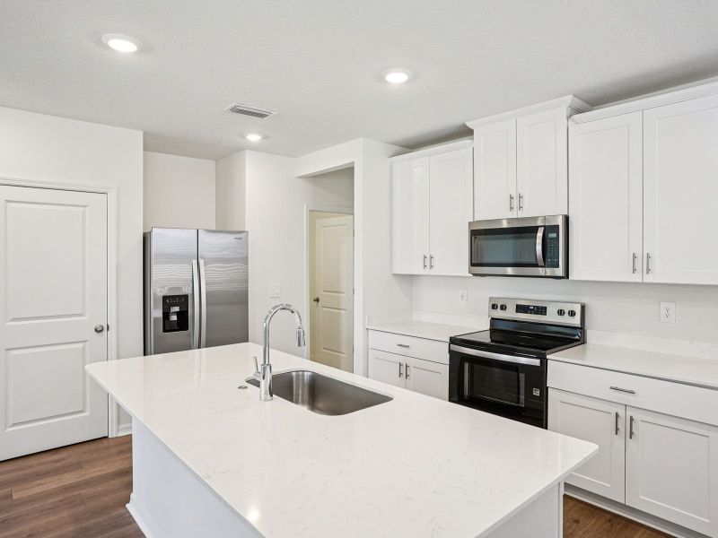 Furnished interior view inside a new home in The Meadow at Crossprairie Townes, St. Cloud (Image 4).