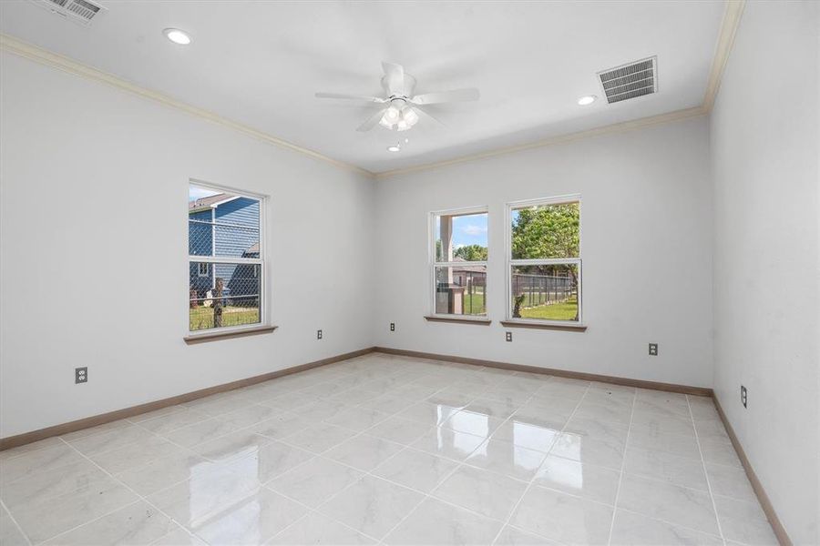 The first floor features a spacious primary bedroom