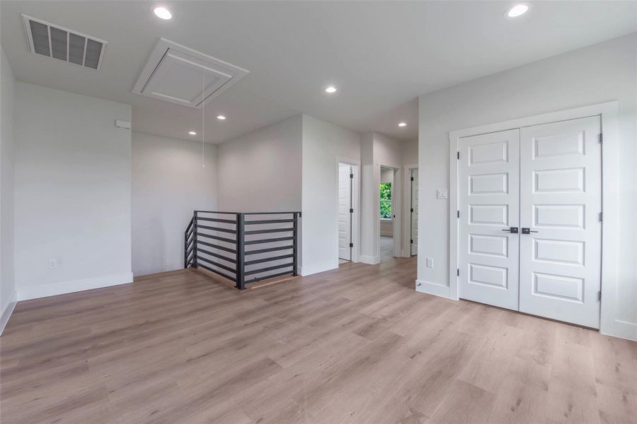 The doors open to two well-appointed secondary bedrooms and the secondary bath. The doors open to two well-appointed secondary bedrooms and the secondary bath.