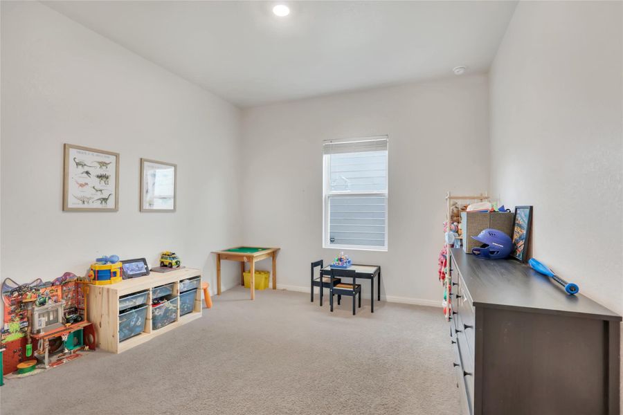 First floor bedroom, perfect for playroom, guest room or office space