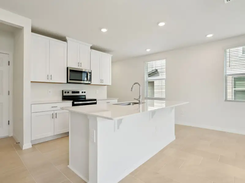 Furnished interior view inside a new home in Cagan Crossings West, Clermont (Image 4).