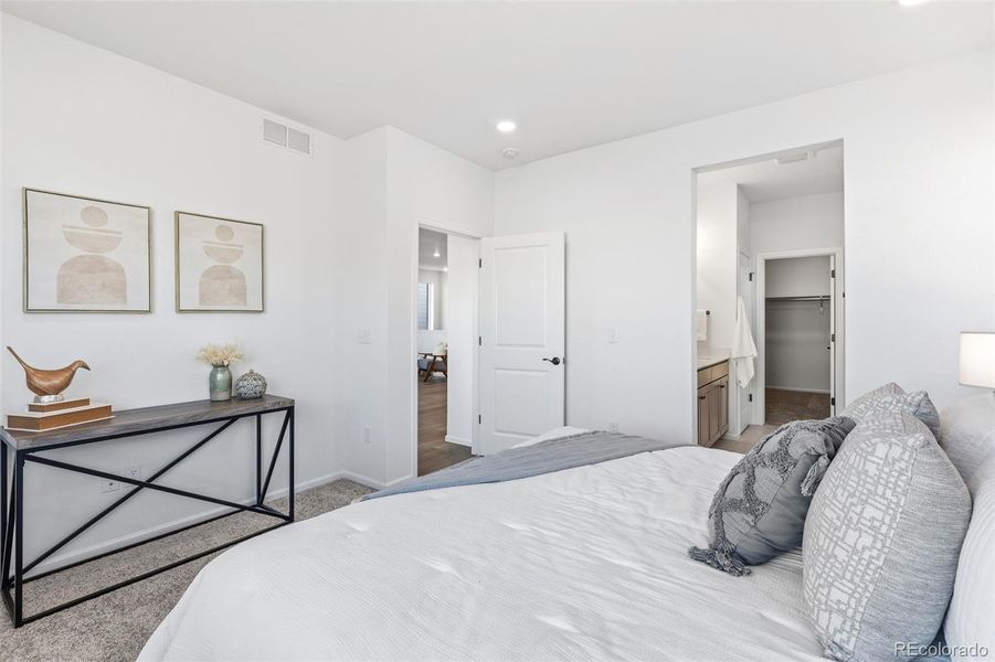 Furnished interior view inside a new home in The Cottages Collection at Ridgeline Vista, Brighton (Image 30).