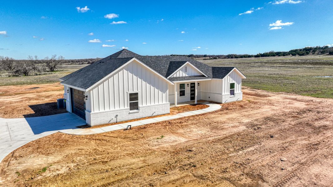 Representative exterior photo of a completed home built from the Lucas by Zeal Home Builders in Echo Grove, Poolville, TX (Image 45).