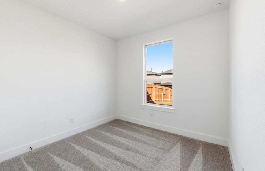 Spacious, unfurnished interior of a new home in Saddleback at Santa Rita Ranch, Liberty Hill (Image 32).