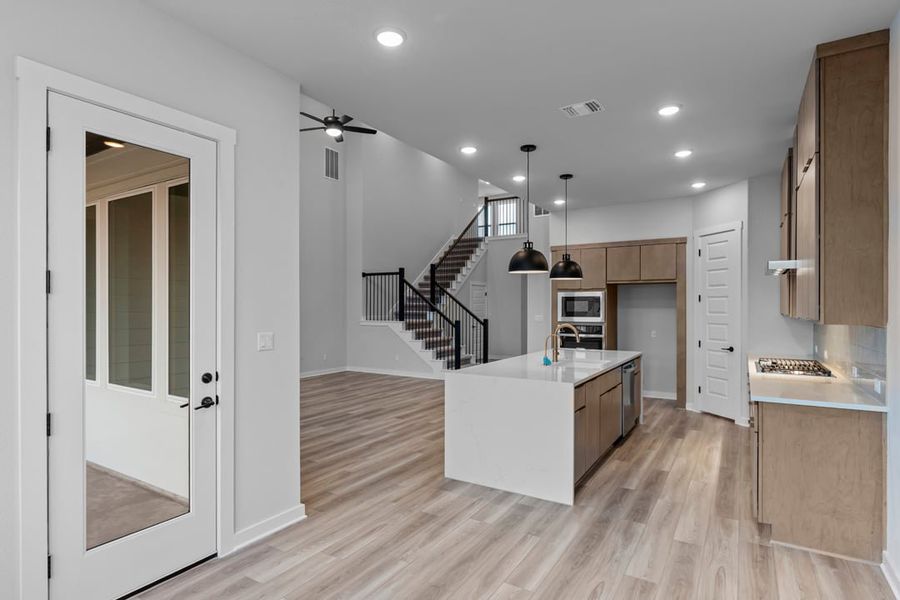 Furnished interior view inside a new home in Park Collection at Lariat, Liberty Hill (Image 12). Furnished interior view inside a new home in Park Collection at Lariat, Liberty Hill (Image 12).