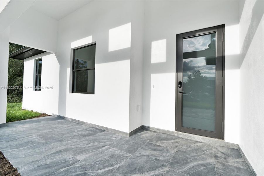 Exterior details and patio area of a home in , Lehigh Acres (Image 4).