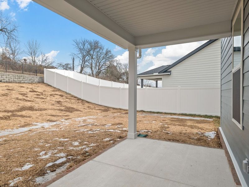 Exterior details and patio area of a home in Woods Crossing, Gallatin (Image 4).