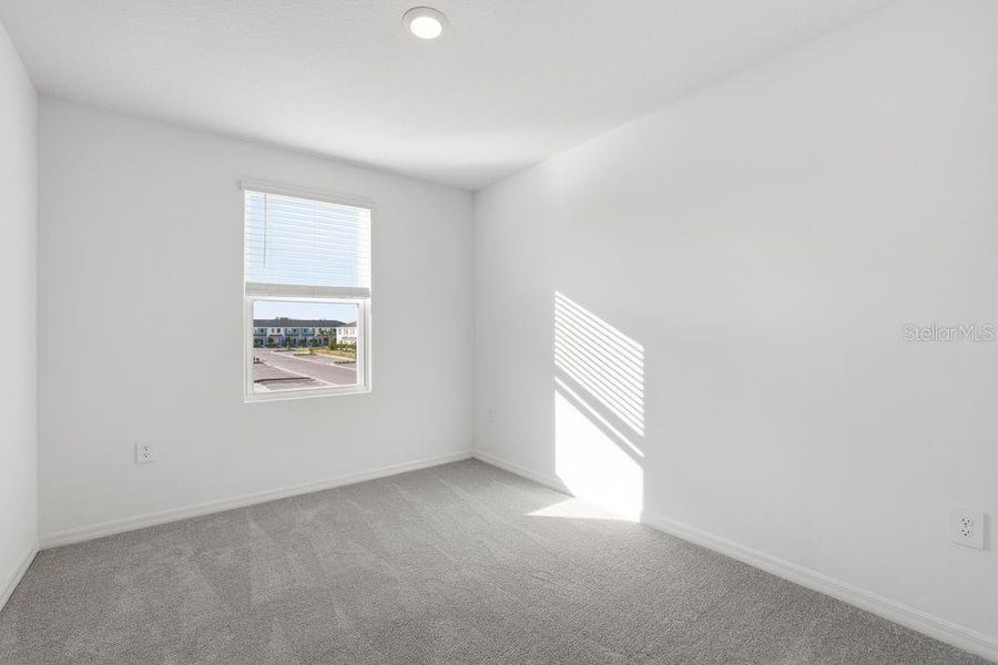 Spacious, unfurnished interior of a new home in The Towns at Firethorn, Parrish (Image 26).