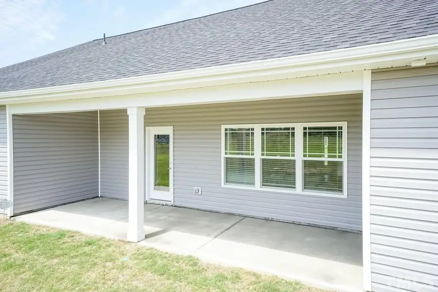 Representative exterior details of a home built from the 3040 by Adams Homes in The Meadow at Britt Crossing, Newton Grove (Image 3). Representative exterior details of a home built from the 3040 by Adams Homes in The Meadow at Britt Crossing, Newton Grove (Image 3).