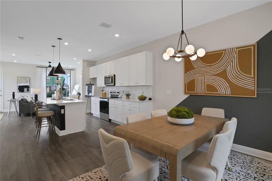 Furnished interior view inside a new home in Serenade at Ovation, Winter Garden (Image 6).