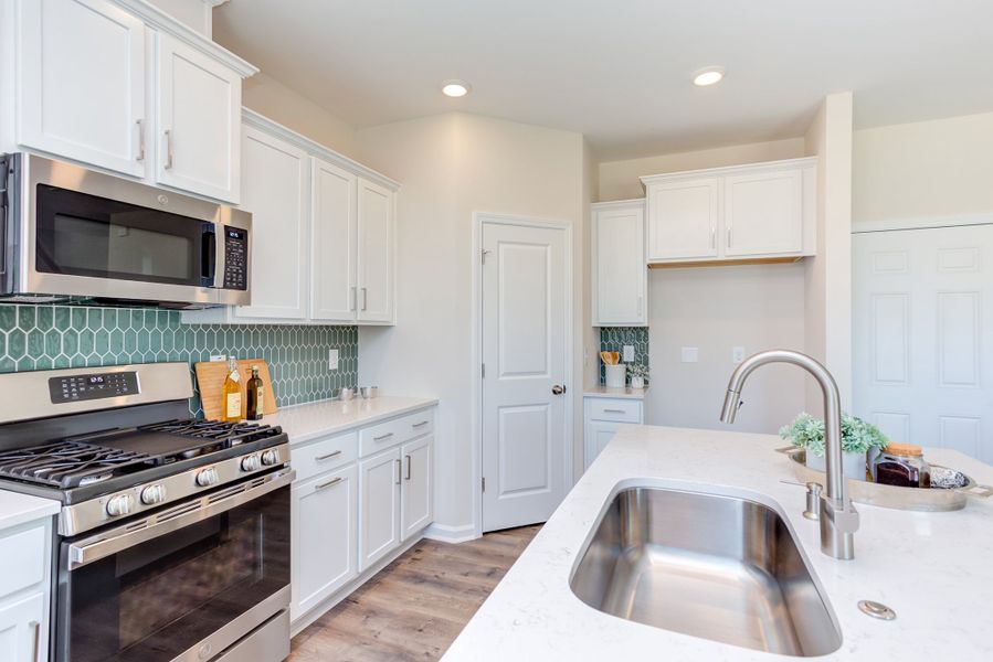 Representative furnished interior of a home built from the The Poppy by Chesapeake Homes in The Willows, Loris (Image 12).