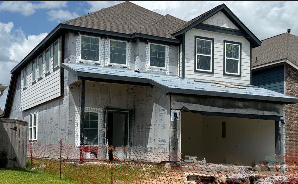 Front exterior of a new home in Dellrose, Hockley, TX, highlighting curb appeal (Image 2). Front exterior of a new home in Dellrose, Hockley, TX, highlighting curb appeal (Image 2).