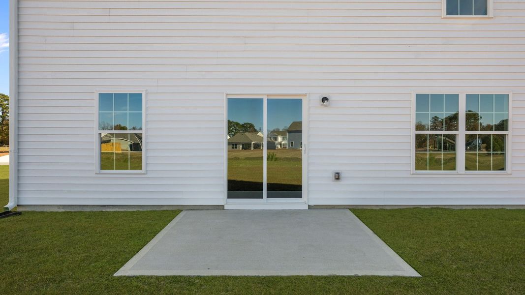 Exterior details and patio area of a home in Madeline Farm, New Bern (Image 4).