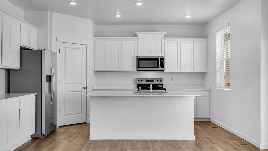 Furnished interior view inside a new home in Vista Meadows, Fort Lupton (Image 6).