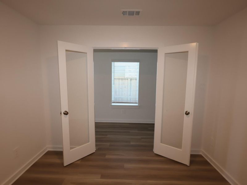 Spacious, unfurnished interior of a new home in Pinewood at Grand Texas, New Caney (Image 21).