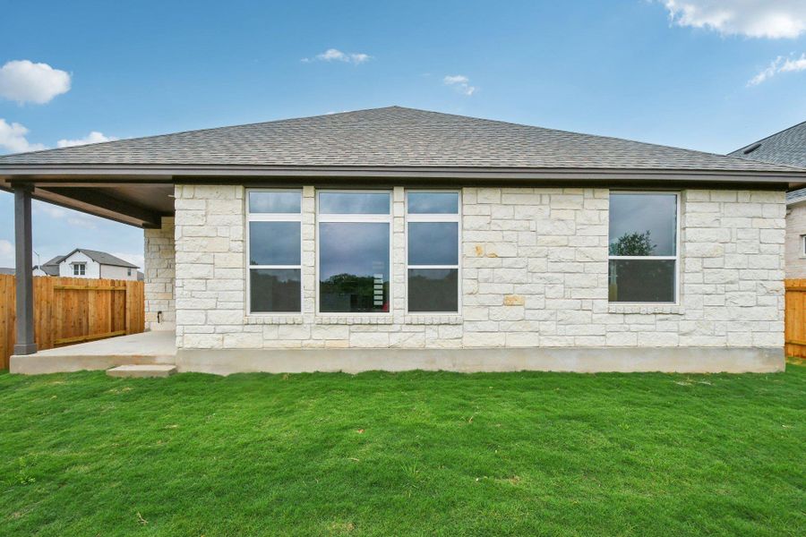 Exterior details and patio area of a home in Persimmon, Buda (Image 22). Exterior details and patio area of a home in Persimmon, Buda (Image 22).