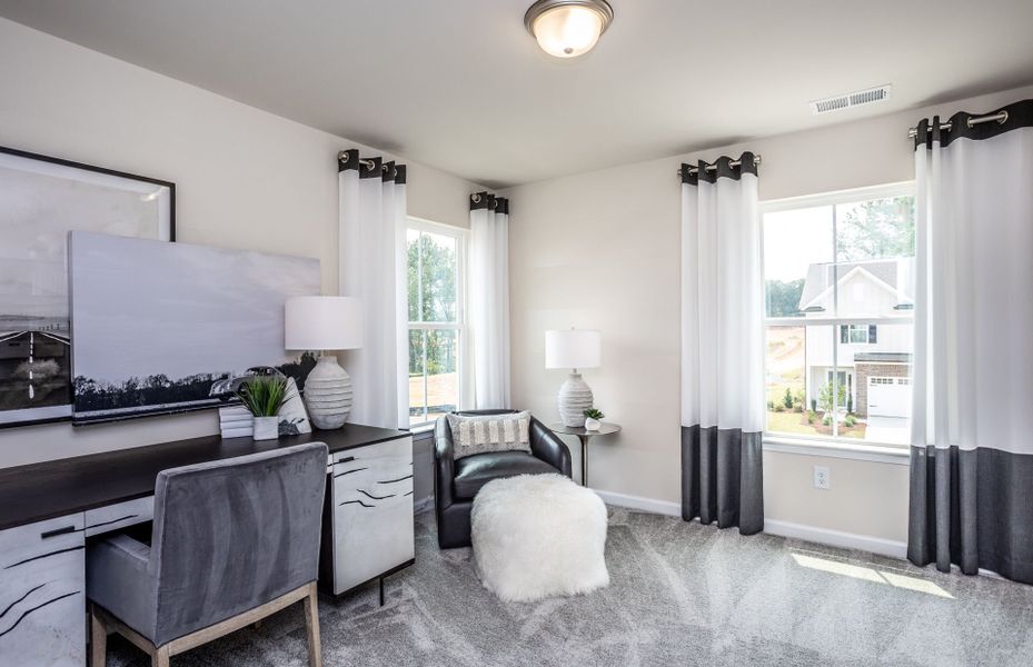 Furnished interior view inside a new home in Exchange at 401, Raleigh (Image 7).