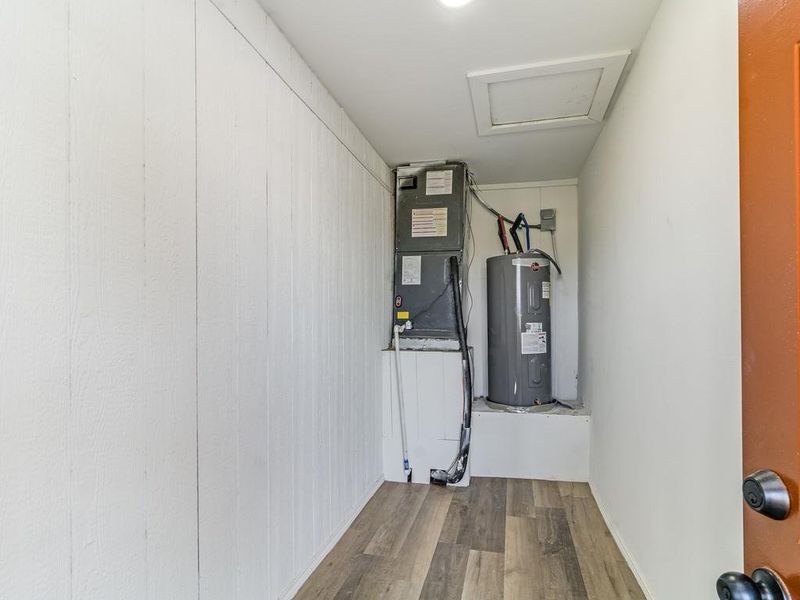 Utilities featuring water heater Utilities featuring water heater