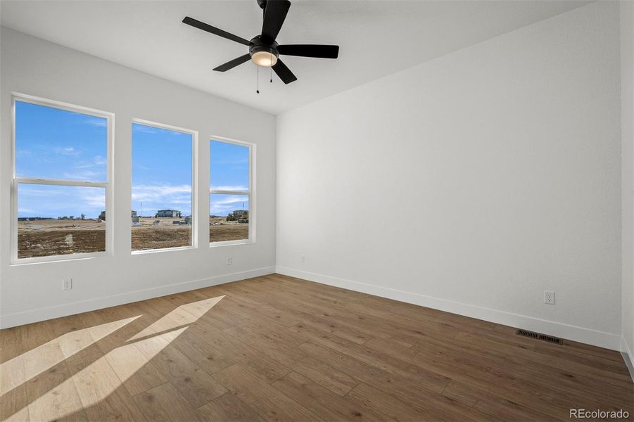 Spacious, unfurnished interior of a new home in Wolf Ranch - Enclave Collection, Colorado Springs (Image 26).