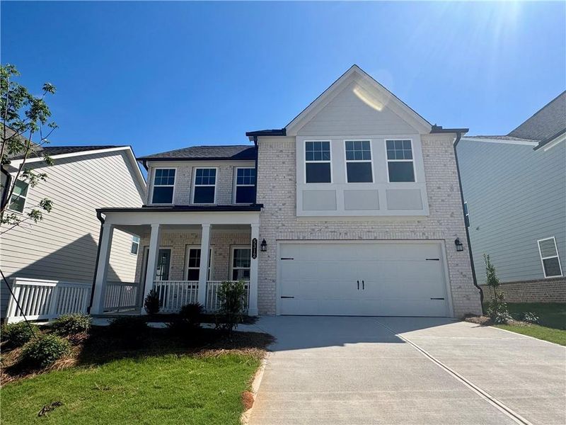 Front exterior of a new home in Eastlyn Crossing, Flowery Branch, GA, highlighting curb appeal (Image 18).