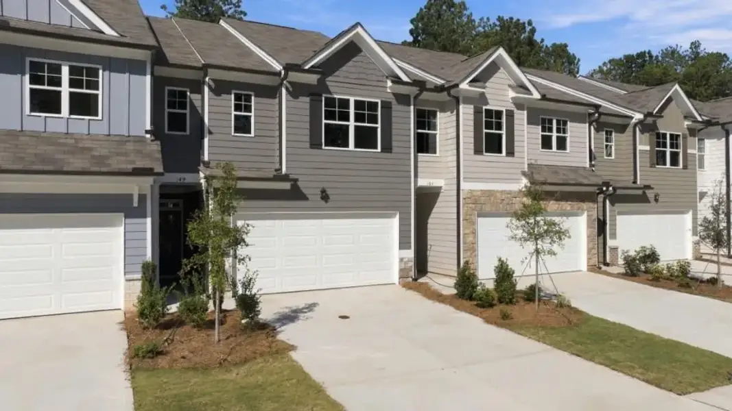 Front exterior of a new home in Hughes Court, Dawsonville, GA, highlighting curb appeal (Image 2).
