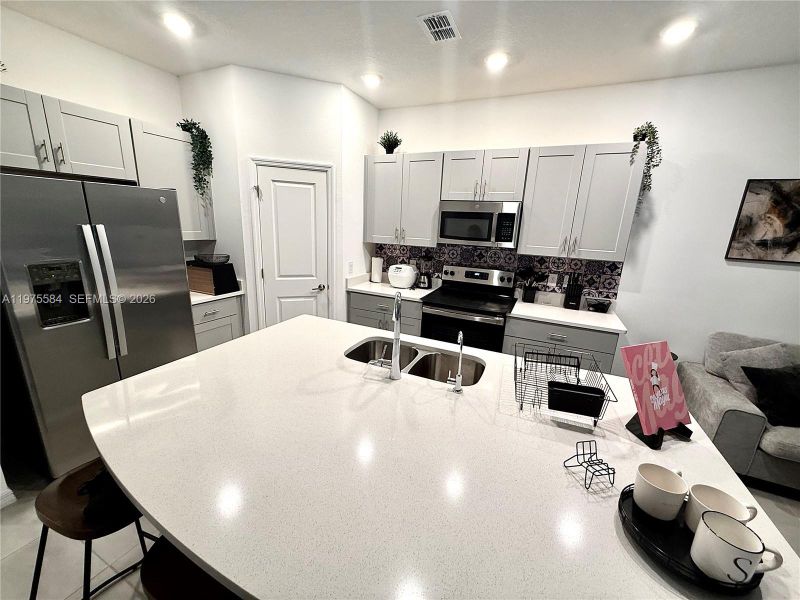 Furnished interior view inside a new home in , Kissimmee (Image 9).