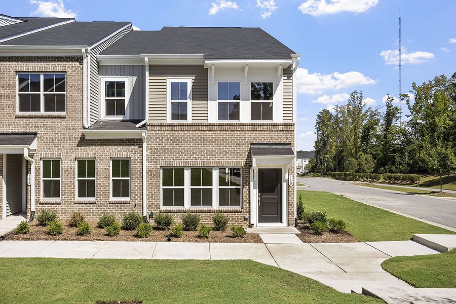 Front exterior of a new home in Renaissance at White Oak, Garner, NC, highlighting curb appeal (Image 1). Front exterior of a new home in Renaissance at White Oak, Garner, NC, highlighting curb appeal (Image 1).
