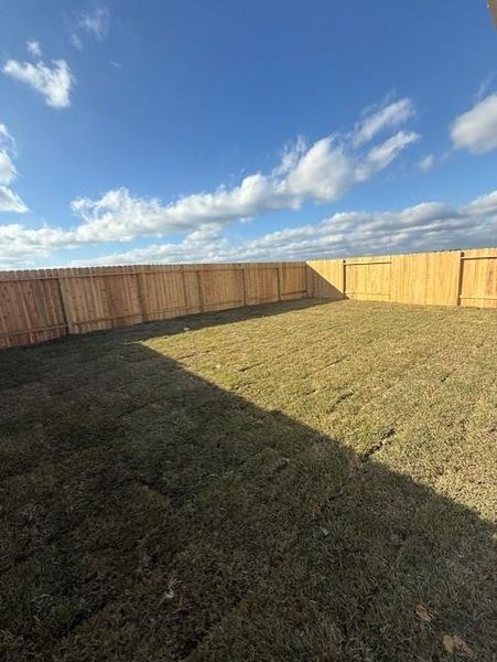 Exterior details and patio area of a home in Townsend Reserve, Splendora (Image 3).