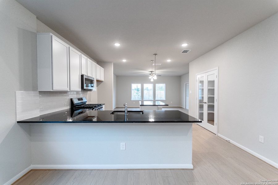Furnished interior view inside a new home in Hennersby Hollow, San Antonio (Image 5).