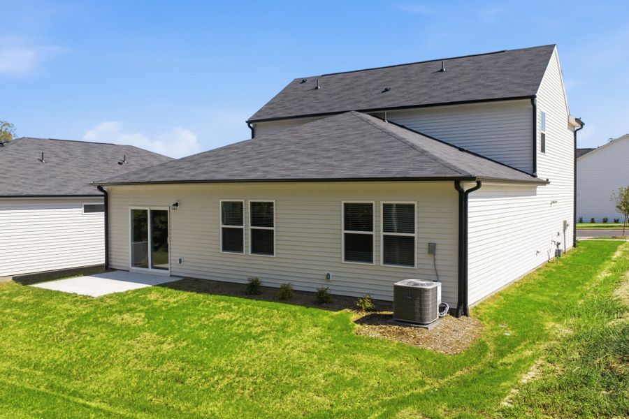 Exterior details and patio area of a home in Carpenter Falls, Durham (Image 4).