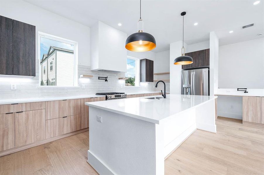 Spacious kitchen island featuring smooth, soft-close cabinetry." (Note: The image provided does not depict a kitchen island or any interior details, so the description is not directly related to the visual content shown. The description is an improved version of the phrase provided by the user.)