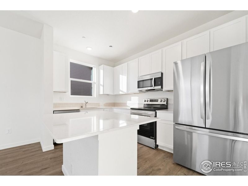 Furnished interior view inside a new home in Liberty Draw, Evans (Image 3).
