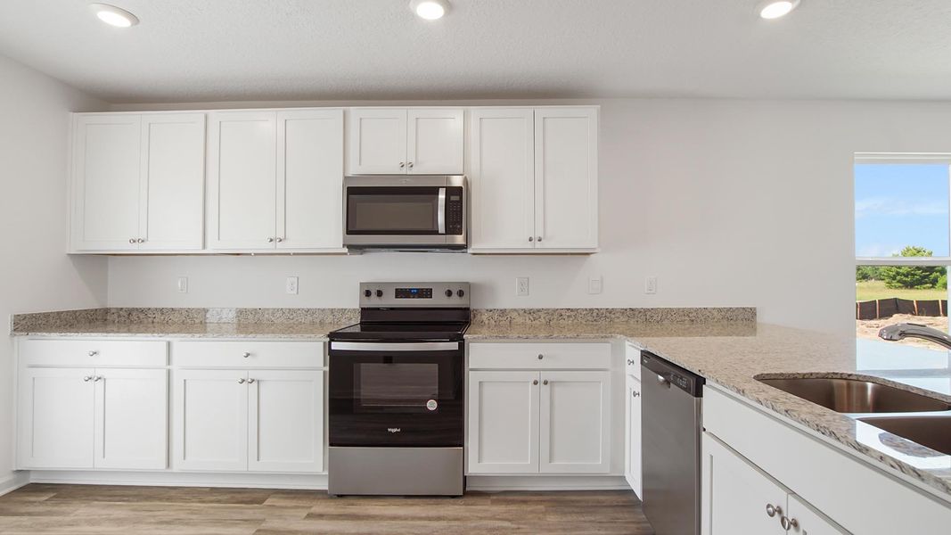 Furnished interior view inside a new home in Owl's Head East, Freeport (Image 6).