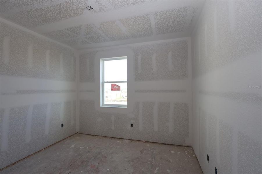 In-progress construction of a new home in Lake Star at Ovation, Winter Garden, FL (Image 23).