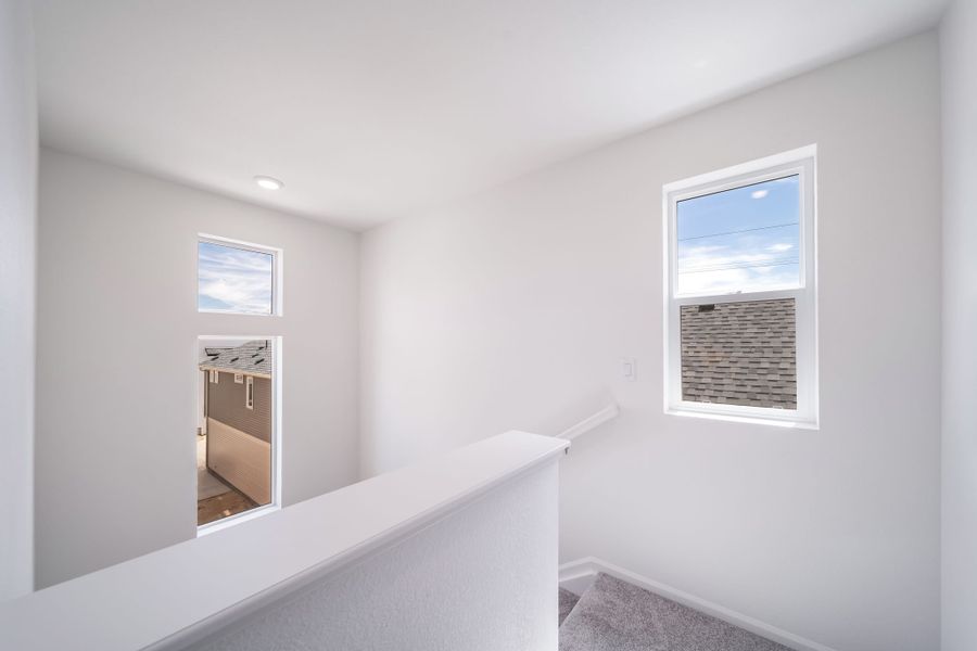 Spacious, unfurnished interior of a new home in Thompson River Ranch, Johnstown (Image 28).