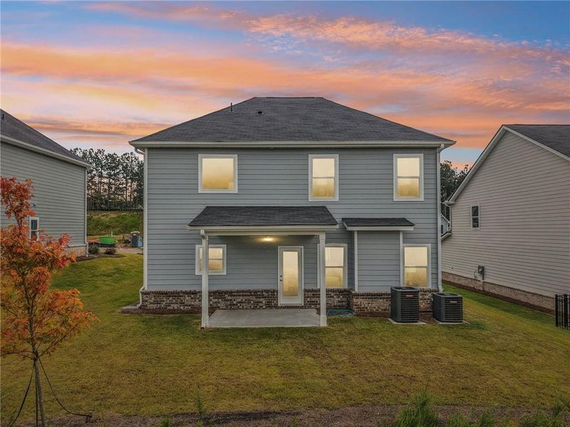 Exterior details and patio area of a home in The Hills at Cedar Creek, Winder (Image 31).