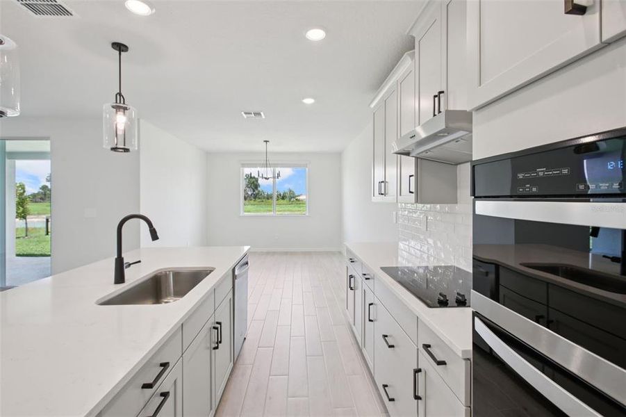 Furnished interior view inside a new home in Two Rivers - Signature Series, Zephyrhills (Image 6).
