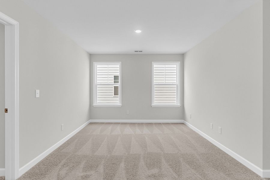 Spacious, unfurnished interior of a new home in Pineland Preserve, Summerville (Image 39).