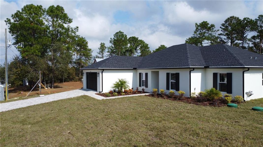 Exterior details and patio area of a home in , Brooksville (Image 2).